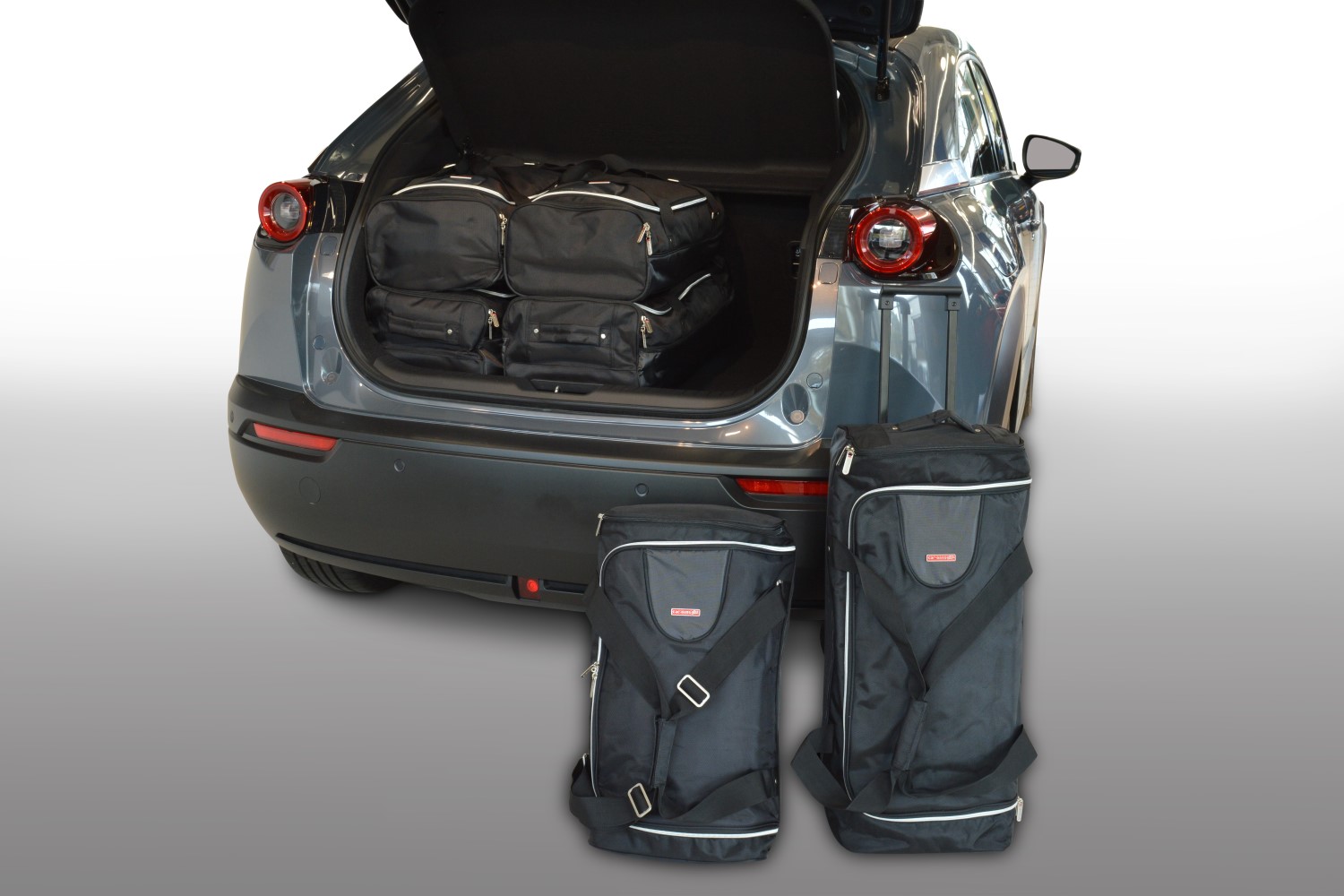 https://www.car-bags.com/images/stories/virtuemart/product/m31401s-mazda-mx-30-dr-2020-car-bags-1.jpg